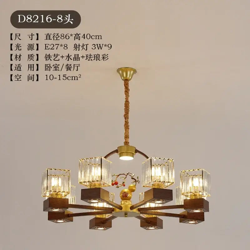 Modern black and gold crystal dining room chandelier with vine design featuring eight crystal-encased lights and wooden bases