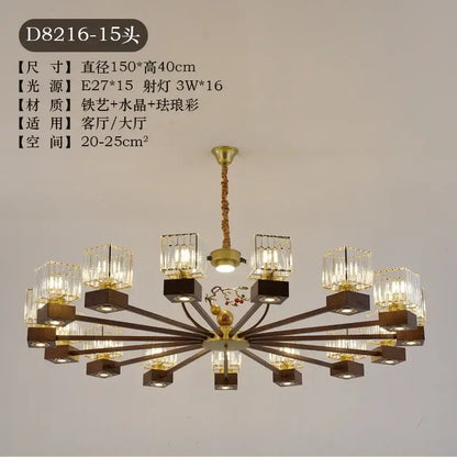 Modern black and gold crystal dining room chandelier with brass hub, dark wood bases, and braided rope decorbites crystal dining