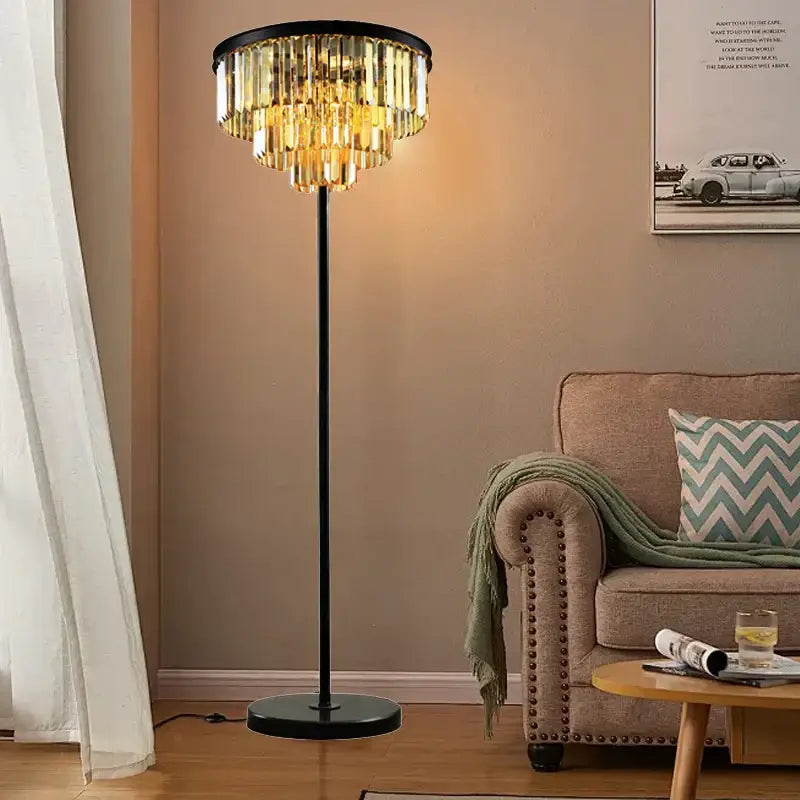 Modern black and gold crystal floor lamp with cascading tiers of golden glass elements for living room decor