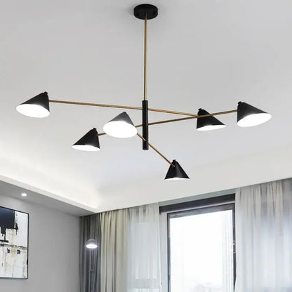 Modern black and gold decorbites cone shade chandelier with brass-toned arms and black rod for dining room lighting
