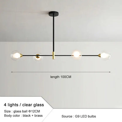 Modern black and gold glass ball pendant chandelier with four clear globe lights ideal for dining room decorbites glass ball