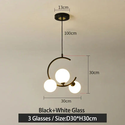 Modern black metal pendant light with black and white glass ball globes decorbites glass ball pendant for living room decor