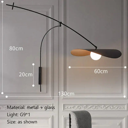 Modern black and gold leaf led wall lamp with curved arm and glass shade for bedroom lighting