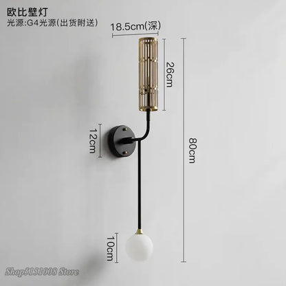Modern brass and black wall lamp with cylindrical slatted fixture and white glass globe for decorbites led wall lamp