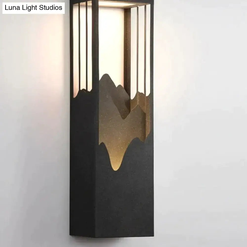 Modern black and gold mountain solar led outdoor light garden sconce with vertical slats for outdoor illumination