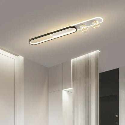 Modern black and gold starry strip flush mount bedroom light with a minimalist black and white design and crystal accents