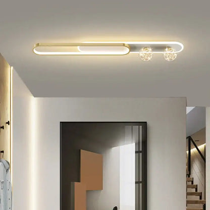 Modern black and gold flush mount ceiling light with gold starry strip and two crystal accents for bedroom decorbites decor
