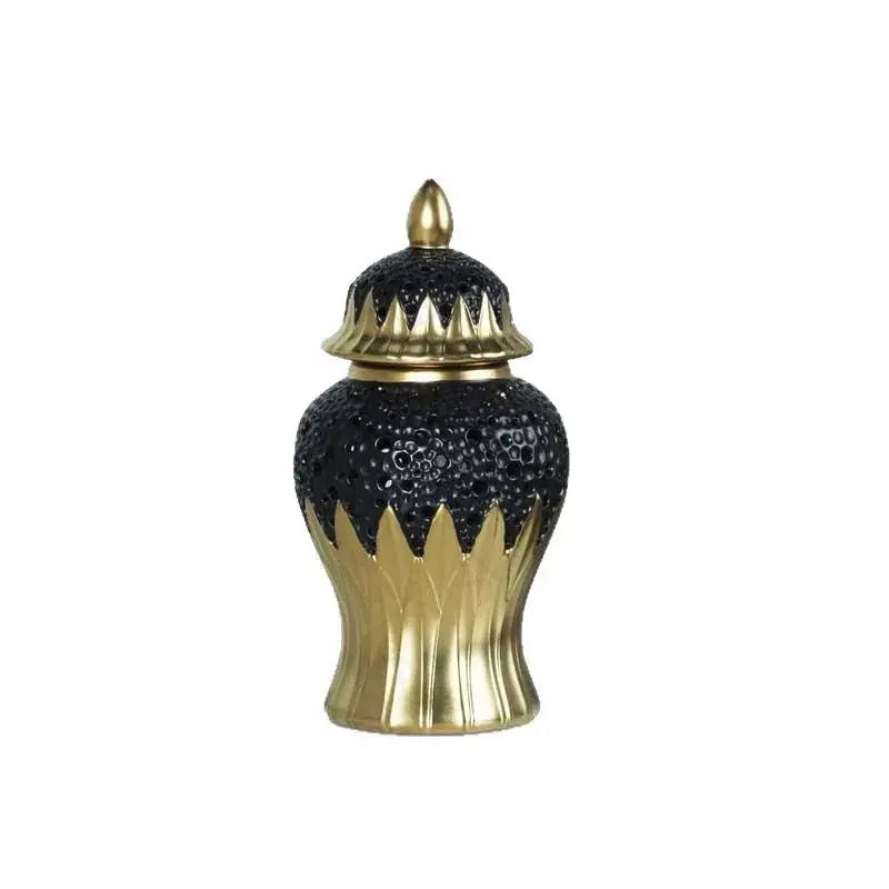 Modern black and golden porcelain jar with textured pebbled surface and brass accents for living room honeycomb decor