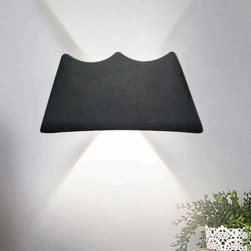 Modern black and silver led wall sconce with matte finish and wavy design casting two beams for 110v-120v use