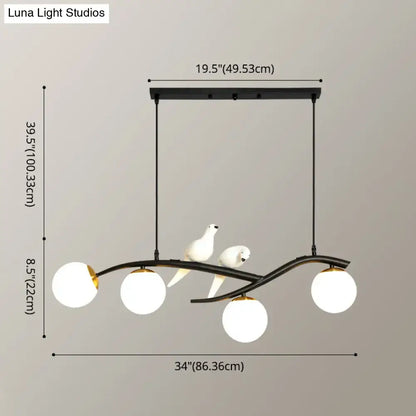 Modern black and white bird linear island pendant light with black metal frame glass shades and ceramic doves