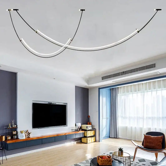 Modern black and white designer arc line dining room chandelier with three curved white led tubes suspended by black cables decorbites designer arc