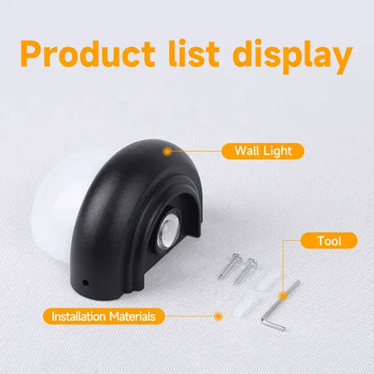Modern black and white dome led wall lamp with black plastic housing and white bulb as a versatile lighting solution
