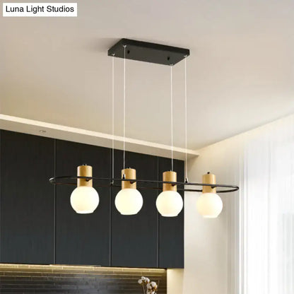 Decorbites black orb island pendant light with wood accents and frosted glass hanging globes for modern decor