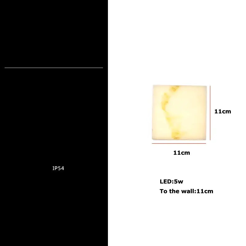 Modern black art deco marble led wall light with warm yellow glow and subtle texture for decorbites bedroom sconce