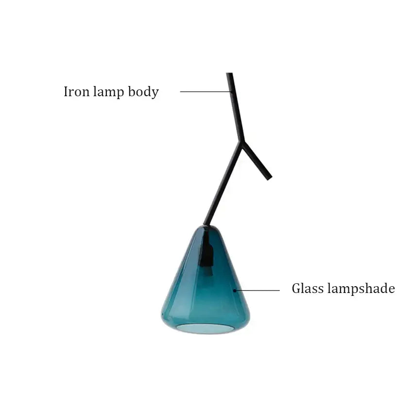 A modern black branching glass pendant light with matte iron frame and translucent teal glass shade for dining rooms