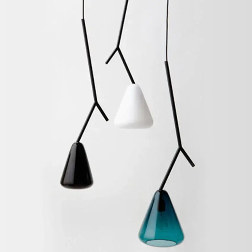 Modern black branching glass pendant lights with conical white, black, and teal glass shades for dining room use