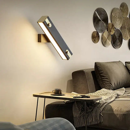 Modern black and brass decorbites adjustable led wall lamp with sleek rectangular design for bedroom sconce decor