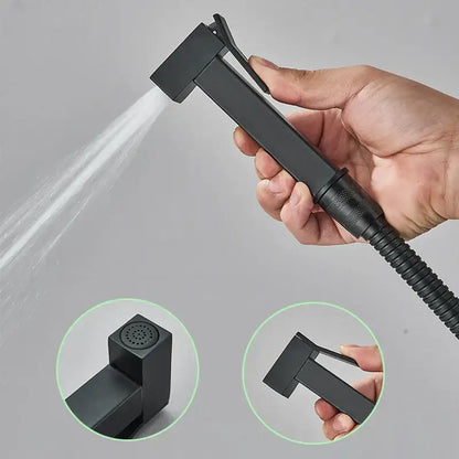 Modern black brass bidet faucet handheld sprayer with black matte finish flexible hose and textured grip by decorbites black brass