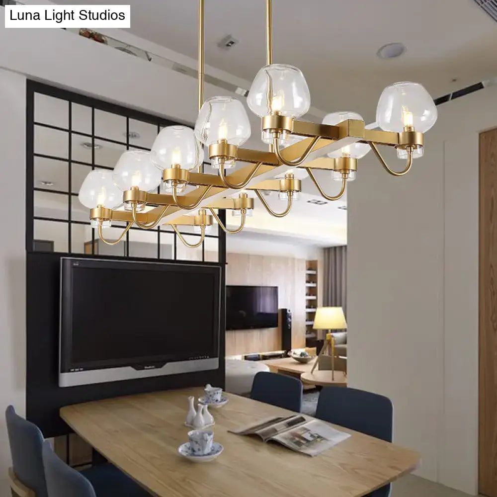 Gold-toned decorbites contemporary island lamp with 10 frosted glass globe bulbs in clear amber smoke finish black brass 110v-120v