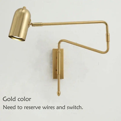 Gold-colored brass wall lamp with articulated arms and cylindrical shade decorbites adjustable long-arm for bedroom use