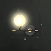 Modern black and brass wall lamp with frosted glass globe ball bedside sconce for bedroom wall mounted light