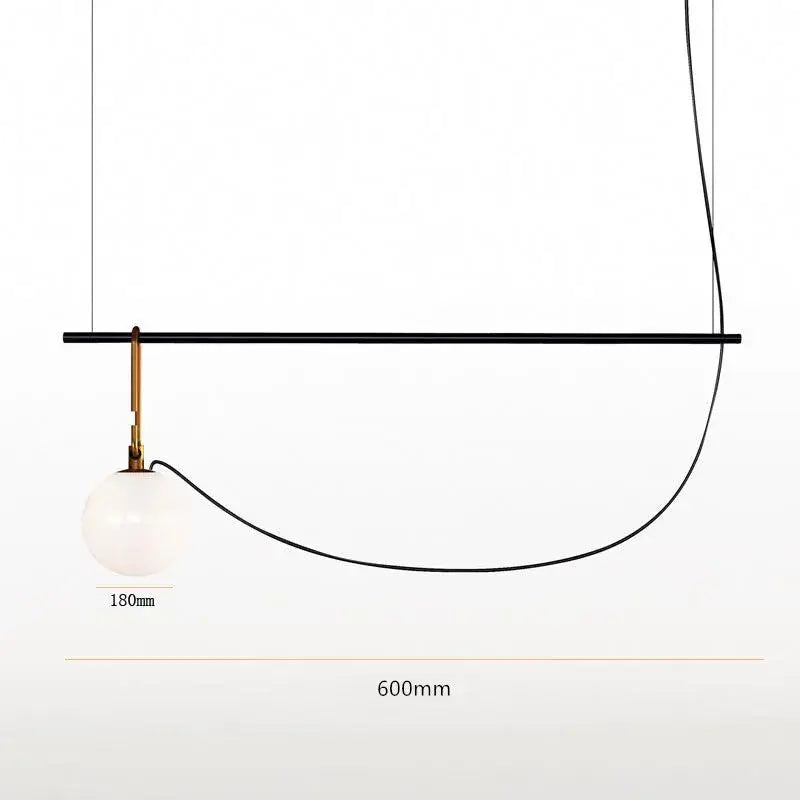 Minimalist black metal pendant light with frosted glass ball and brass accents for modern decorbites glass ball decor