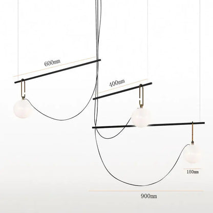 Modern black metal pendant light with three frosted glass ball globes by decorbites for bedroom decor