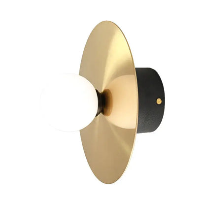 Modern black and brass golden glass ball wall sconce with matte black base and exposed frosted bulb by decorbites golden glass