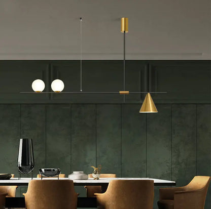Modern black and brass linear chandelier with gold-toned fixture and spherical white glass bulbs for dining room use