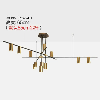 Modern black and brass minimalist dining room linear pendant light with geometric black metal arms and gold cylindrical fixtures