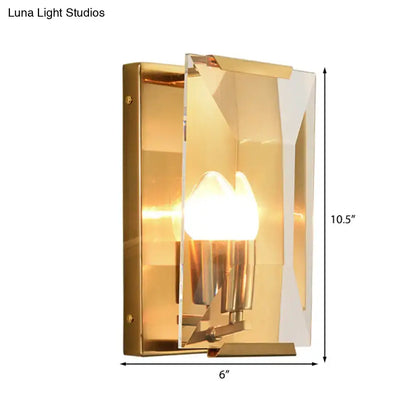 Modern black brass sconce light with gold finish clear geometric acrylic shade and exposed brass hardware for bedroom use