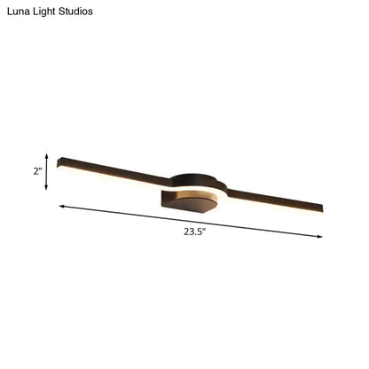 Modern black and brass slim line led vanity light with sleek black and gold finish and two elongated arms emitting white warm light