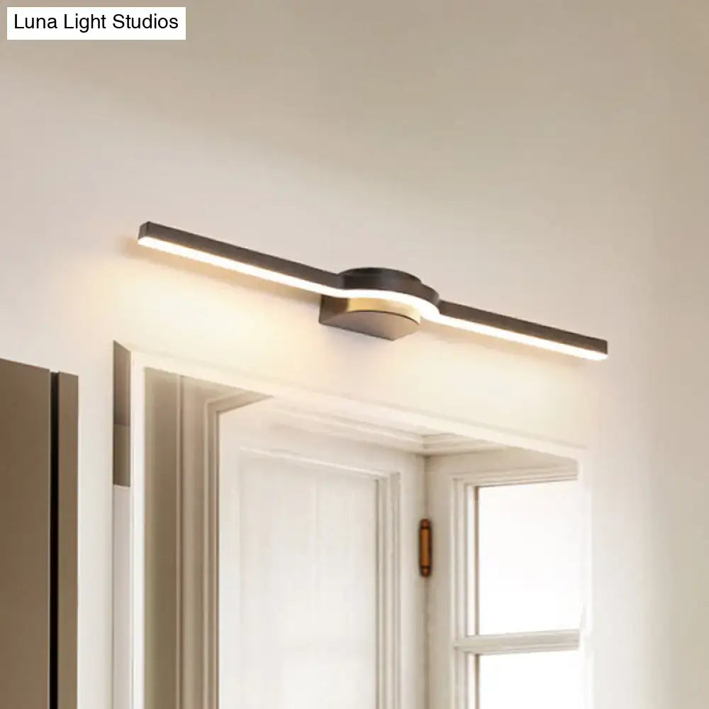 Modern black and brass slim line led vanity light with a sleek metal frame and warm white light for bathroom use