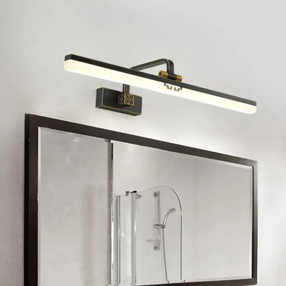 Modern black and brass wall vanity light with a sleek rectangular design for light metallic mirror bathroom cabinets