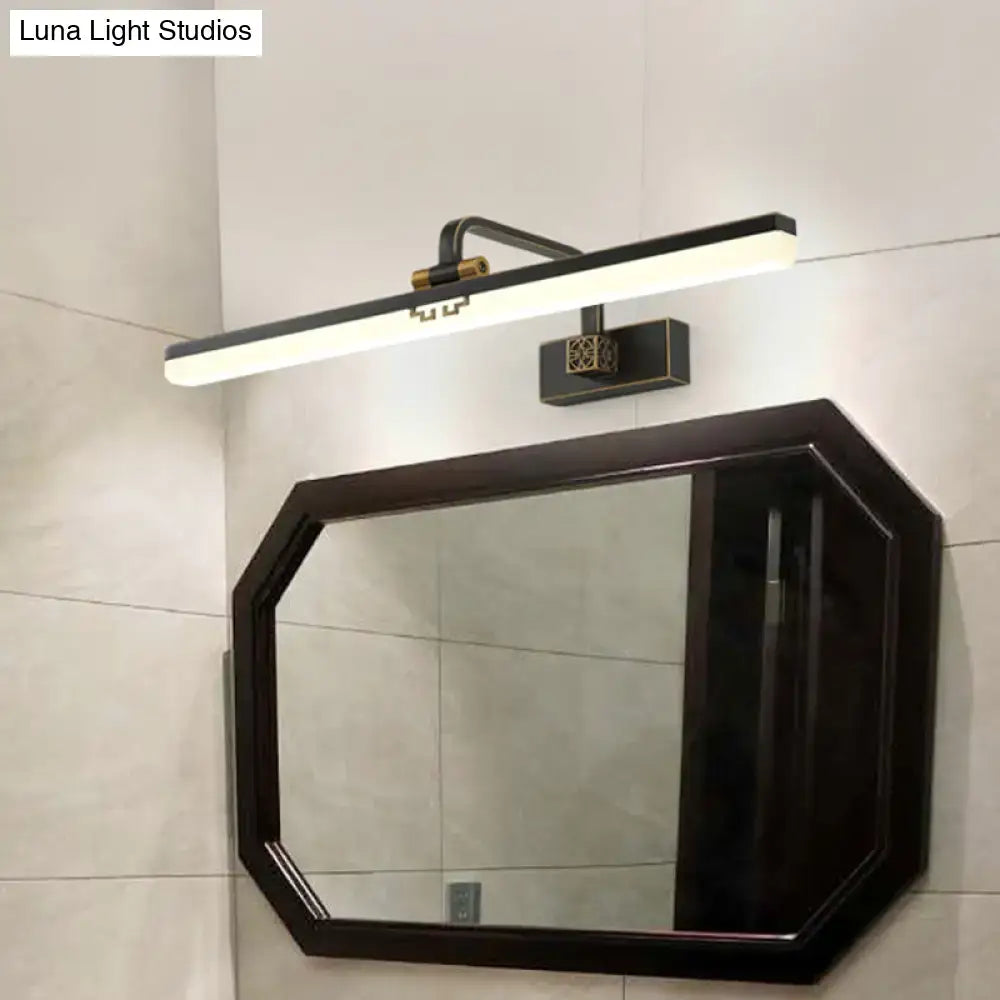 Modern black and brass wall vanity light with sleek rectangular design for metallic mirror bathroom cabinets