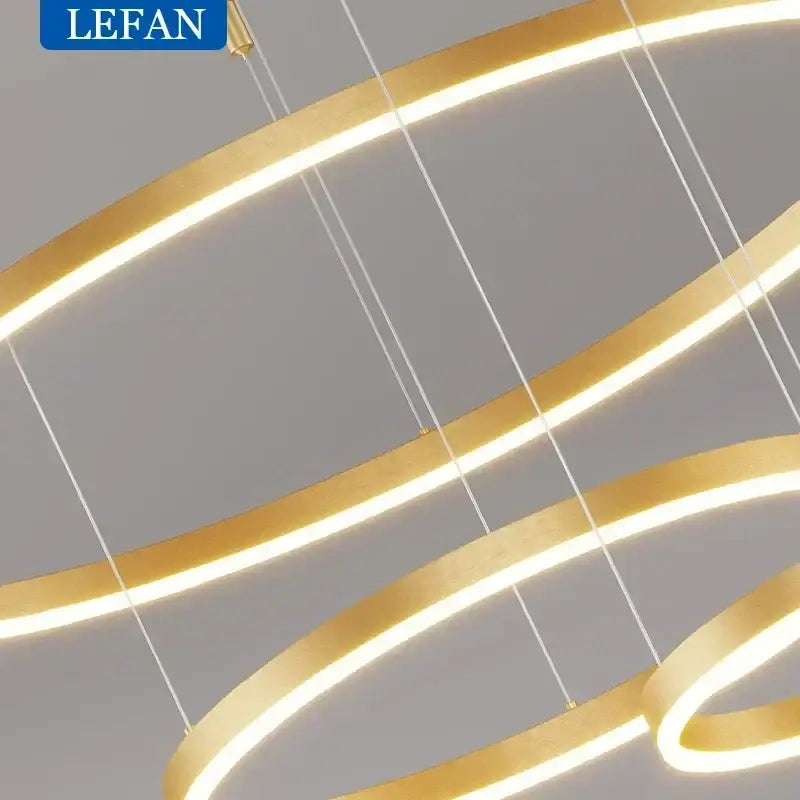 Modern gold-colored rings led chandelier with concentric brushed rings led design for living room decorbites brushed rings