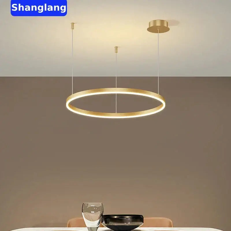 Modern black brushed rings led chandelier featuring a gold-toned circular led pendant light with sleek minimalist design