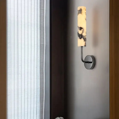 Modern black carbon steel led wall lamp with alabaster bedroom shade featuring a sleek chrome arm decorbites carbon steel