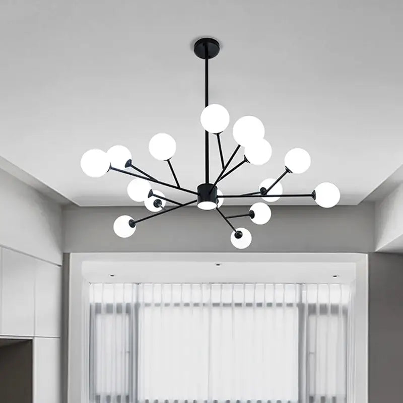 Modern black chandelier with gold accents and frosted white glass globes for elegant living room decorbites black chandelier