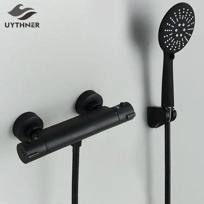 Modern black chrome brass shower set with black matte finish wall mount mixer and handheld showerhead by decorbites