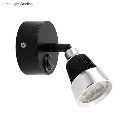 Black and silver adjustable wall light with chrome finish and ribbed heat sink featuring smd light for bedroom use