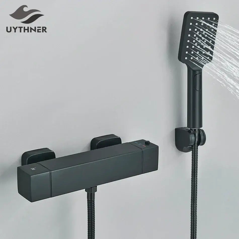Modern black and chrome thermostatic shower set with black matte finish handheld spray and wall-mounted control unit decorbites black chrome