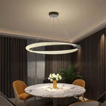 Modern black circle chrome chandelier featuring a sleek double-ring led pendant light with warm glow by decorbites black circle