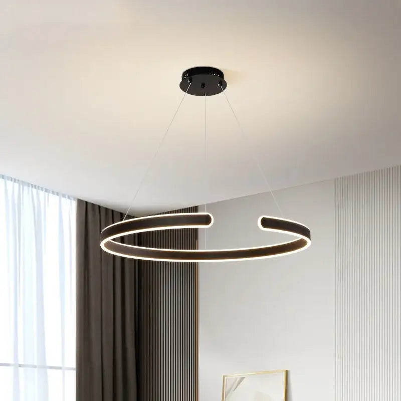 Modern black circle pendant chandelier with minimalist led design and warm light for living room decorbites circle pendant