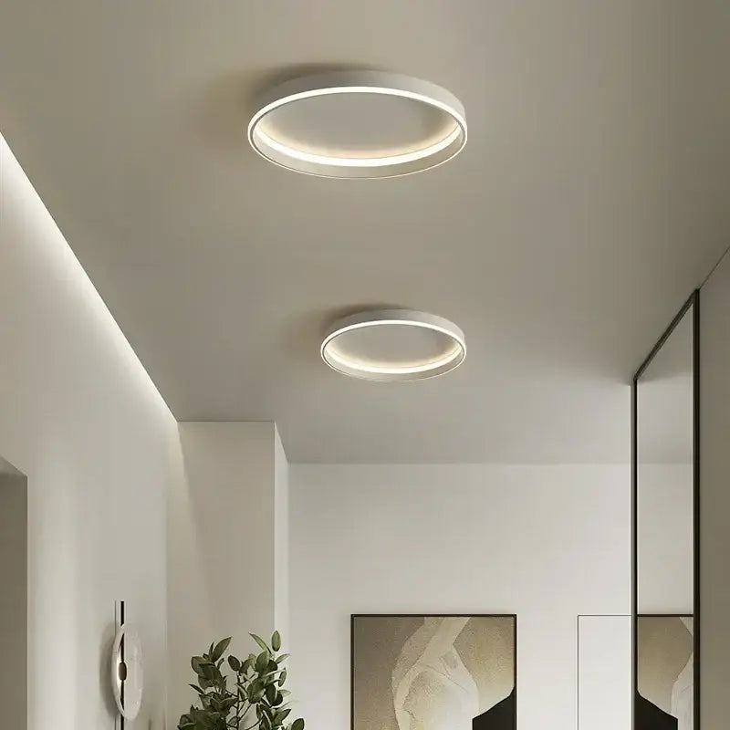 Modern black circular led ceiling light with sleek white frame and warm glowing ring for living room decorbites circular led