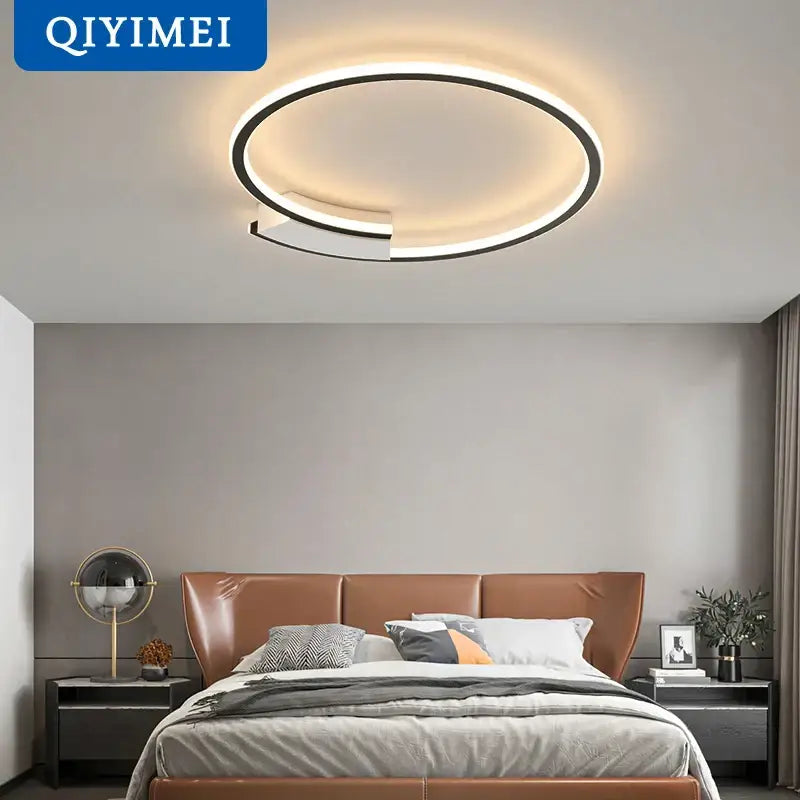 Modern black circular led indoor ceiling lamp with sleek frame and warm white illumination for living room decorbites indoor ceiling