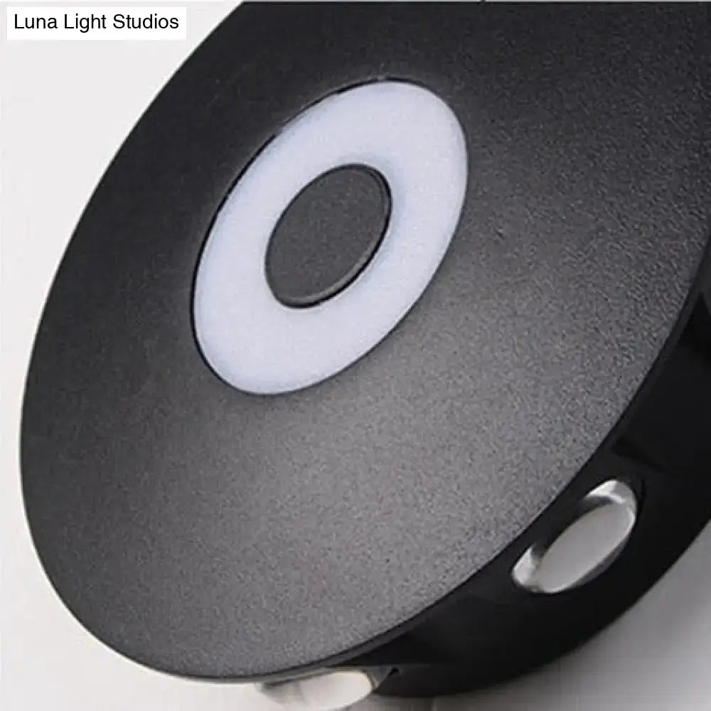 Modern black circular led outdoor wall sconce with matte finish white ring and black button for outdoor wall lighting