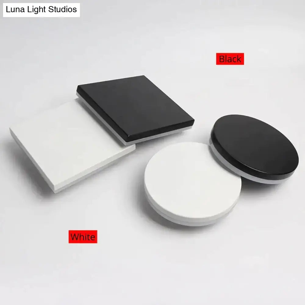 Black and white square and circular glossy display stands showcasing modern black circular waterproof wall lamp three disc set