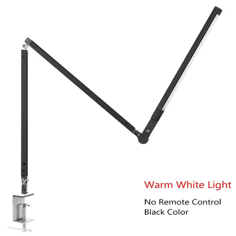 Modern black clip led desk lamp with adjustable arm and clamp base providing warm white light for office reading