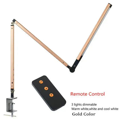 Gold-colored decorbites clip led desk lamp with adjustable articulated arm and clamp base for office reading light